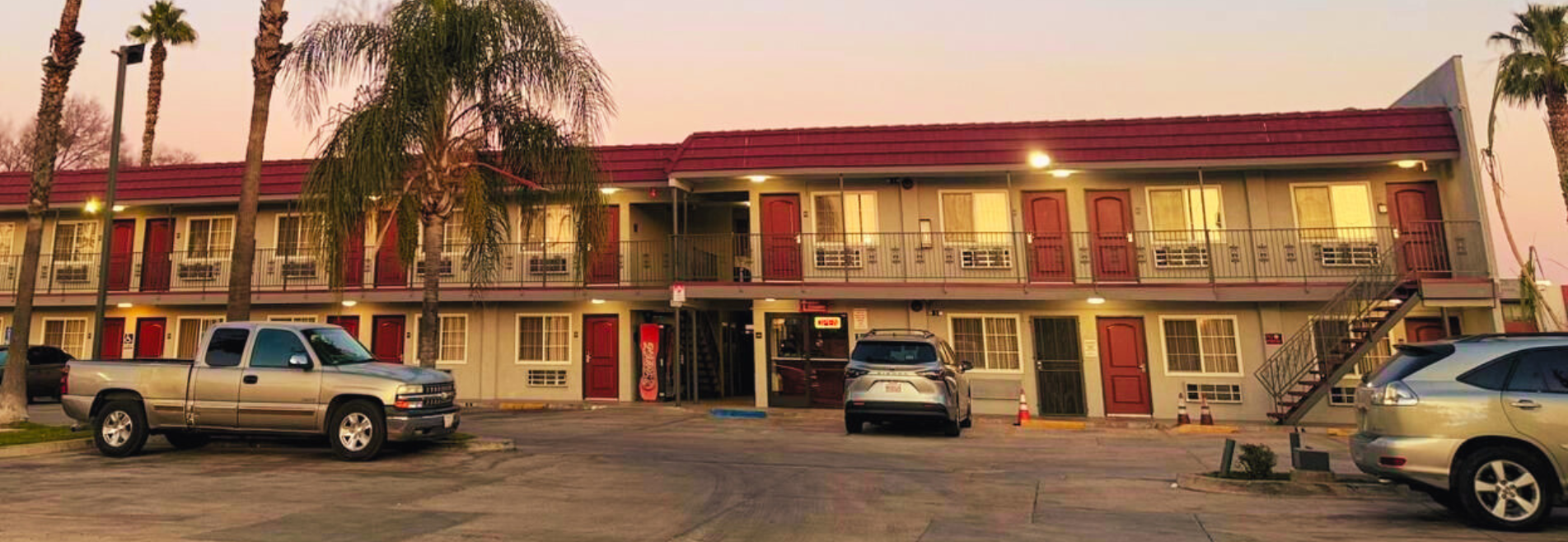 Front view of Simple Stay Suites, an affordable motel with options for hourly stays and pet-friendly accommodations.